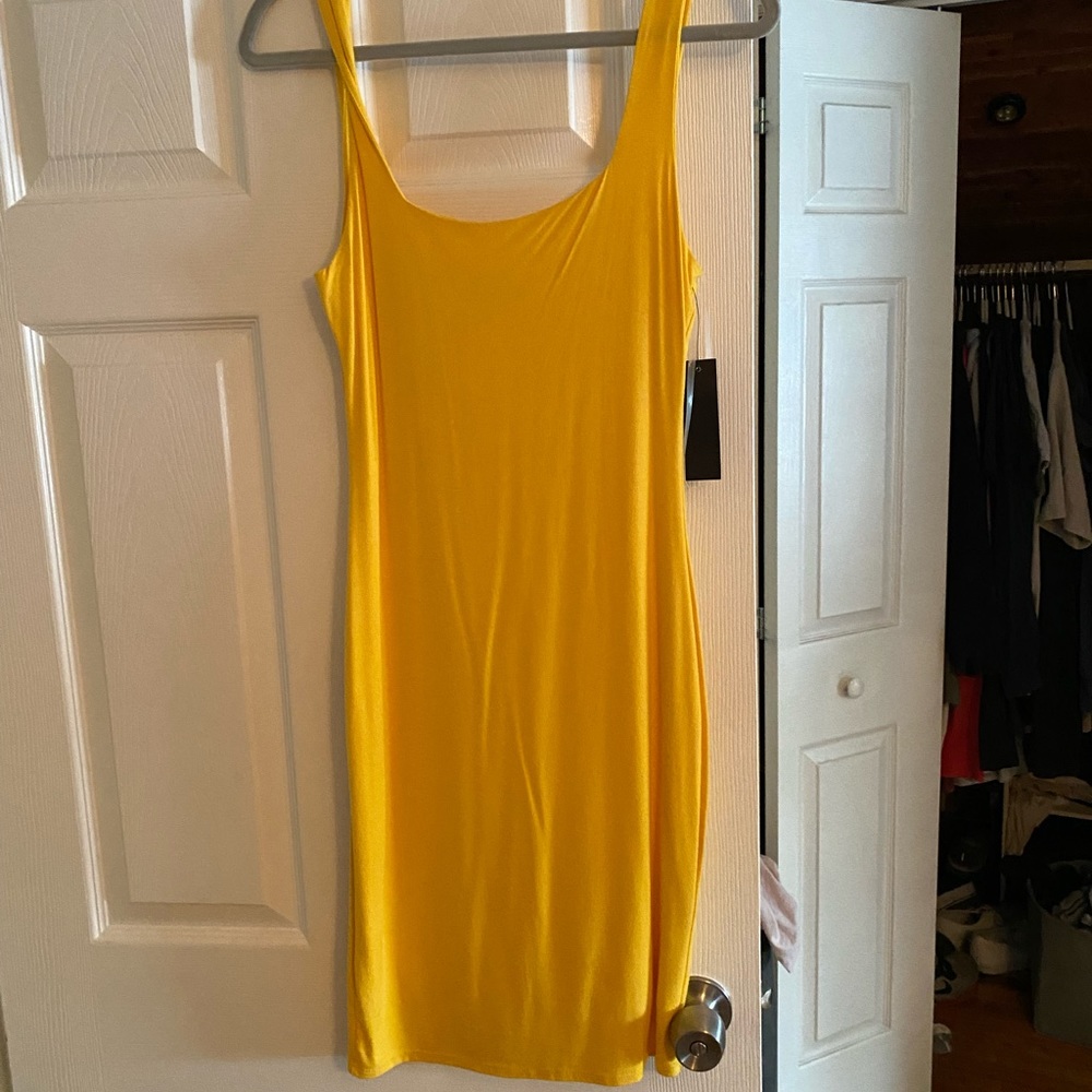 Bright yellow tight midi dress